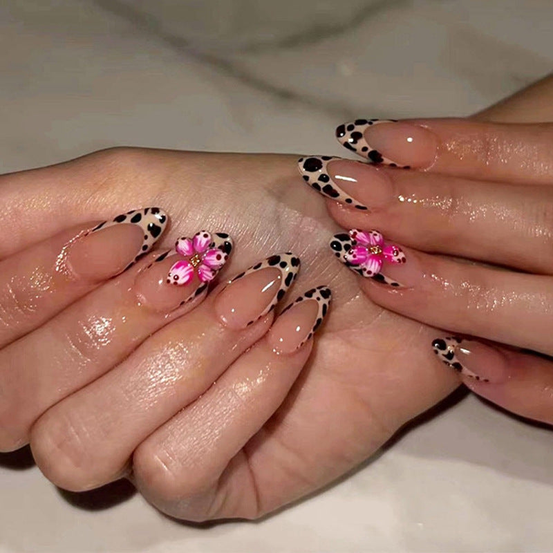 Nail art set with trendy floral designs and elegant dots Stornfield