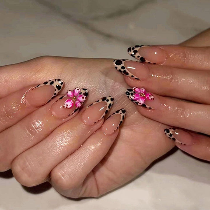 Nail art set with trendy floral designs and elegant dots Stornfield