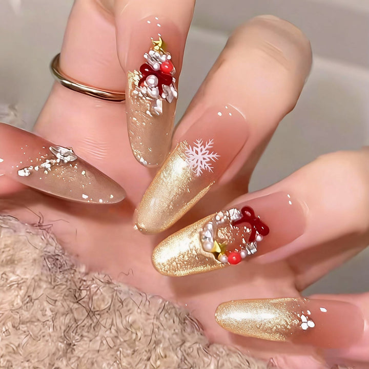 Artificial nail set with festive gift design and elegant glitter accents Stornfield