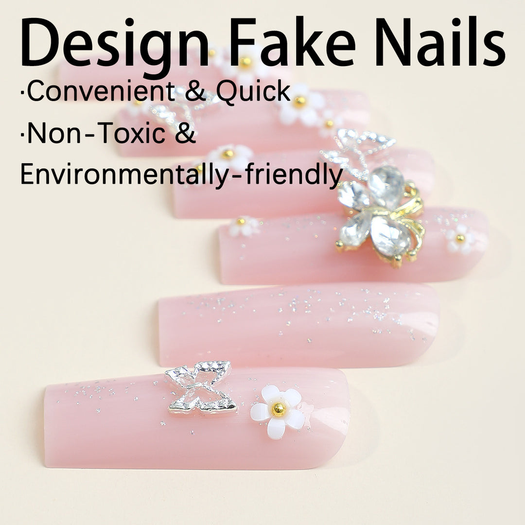 Artificial nail set with floral and glittering accents Stornfield