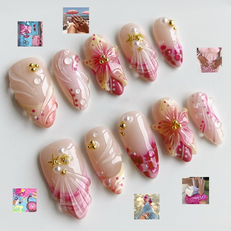 Creative nail art set with romantic flower pattern and sparkling accents Stornfield