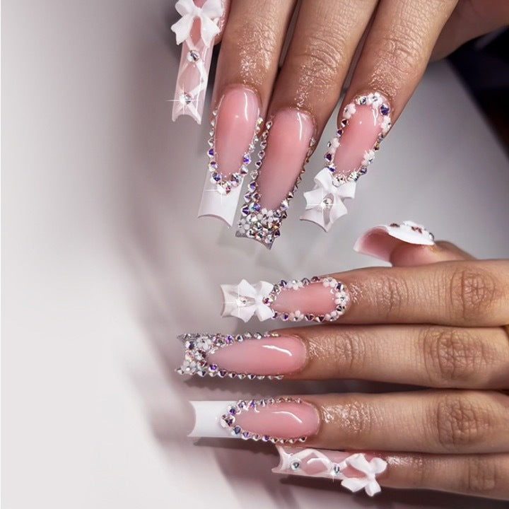 Elegant artificial nails with rhinestones and floral design Stornfield