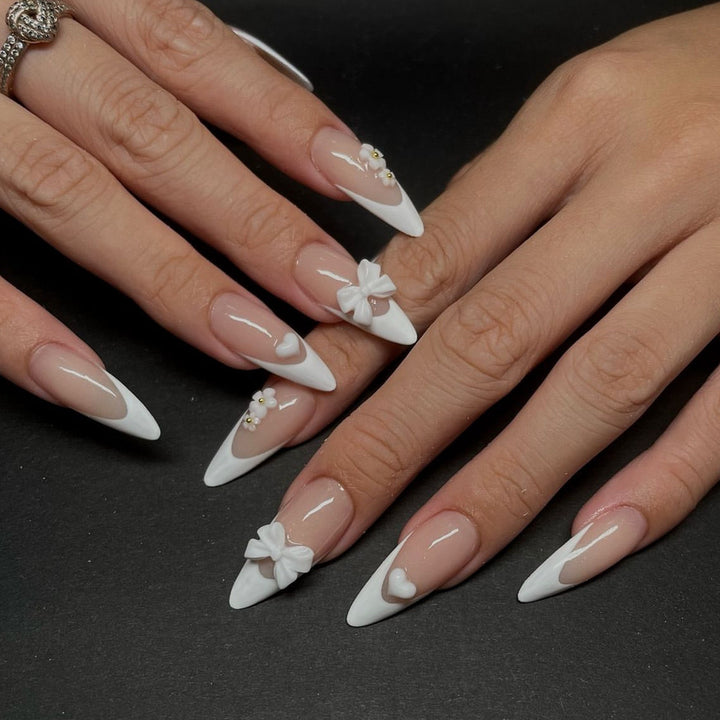 Artificial nail tips with playful 3D decorations Stornfield