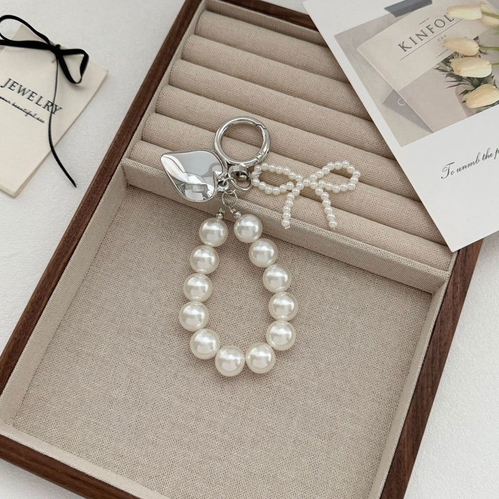 Elegant Pearl Charm Keychain Stornfield