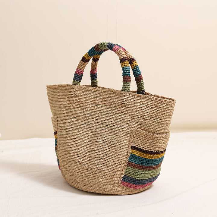 Handcrafted basket bag with colorful stripe accents Stornfield