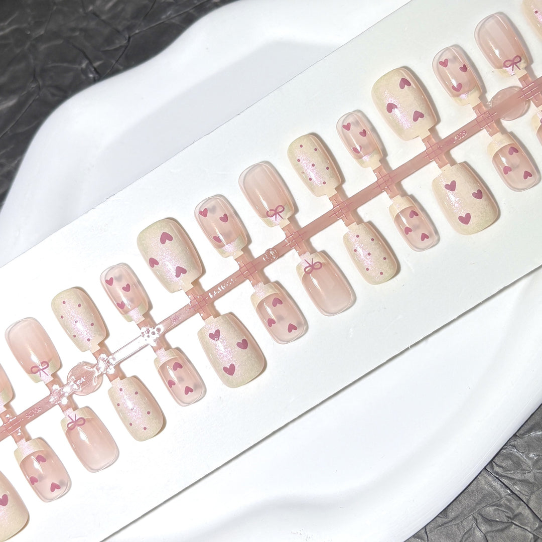 Decorative Press-On Nail Set with Heart and Bow Designs