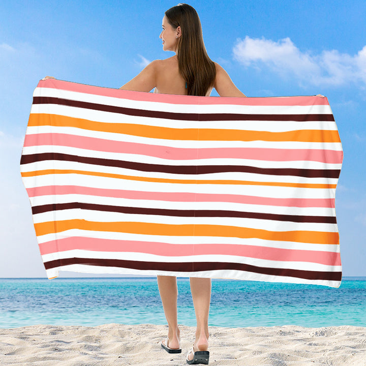 Beach towel with vibrant gradient color and stylish striped design Stornfield