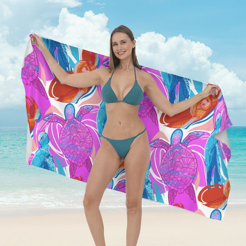 Beach towel with vibrant tropical plant motif Stornfield