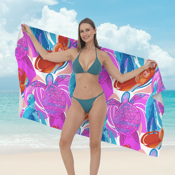 Beach towel with vibrant tropical plant motif Stornfield