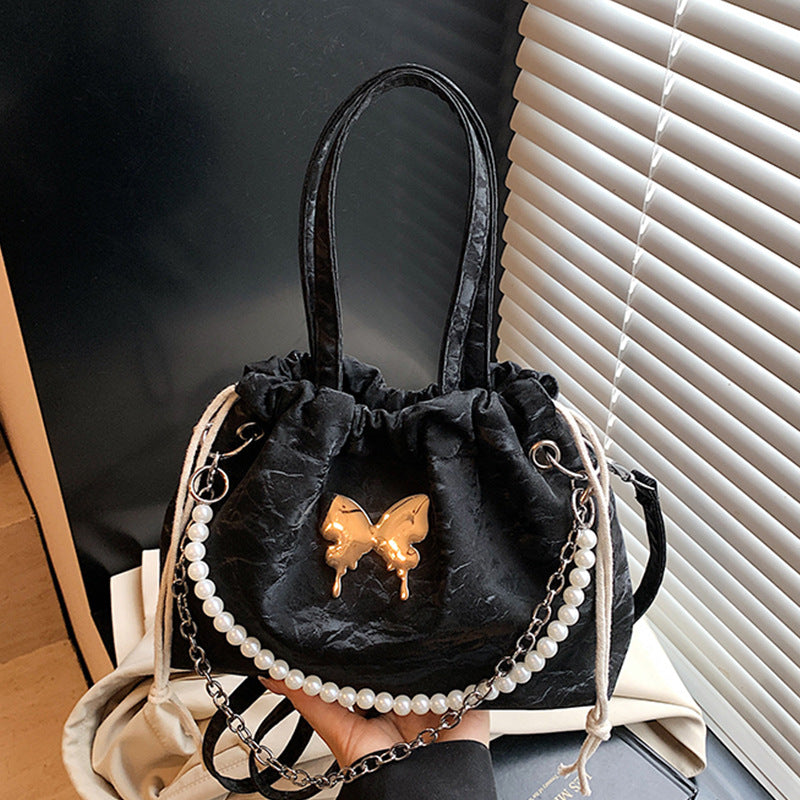 Elegant Pearl-Accented Mini Drawstring Handbag