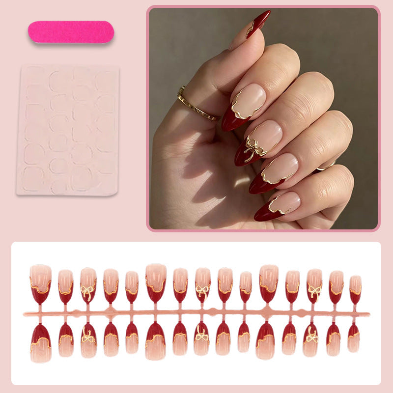Fake nail set with flower and gold details Stornfield