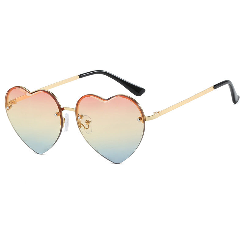 Women's Heart-Shaped Sunglasses with Mirrored Lenses and Fashionable Metal Frame Stornfield