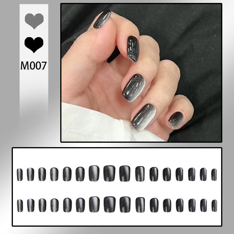 Artifical nail set with glamorous ombre effect and glitter embellishments Stornfield