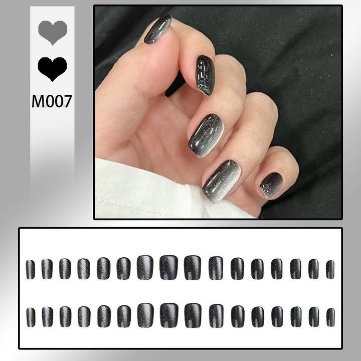 Artifical nail set with glamorous ombre effect and glitter embellishments Stornfield