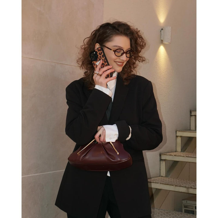 Designer handbag with unique handle Stornfield