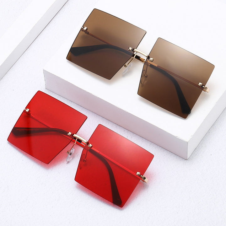 Women’s modern geometric sunglasses with filigree metal frame Stornfield