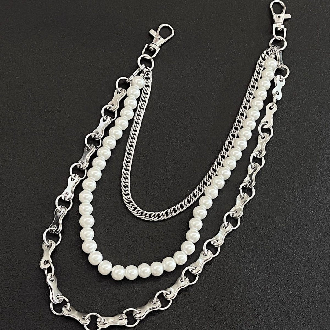 Fashionable chain bracelet with pearls and metal links Stornfield