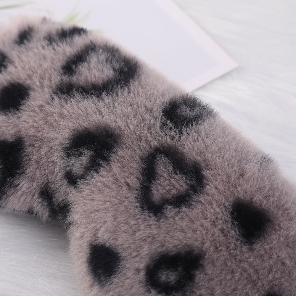 Women's cuddly faux fur sleep mask with heart-embossed surface and gathered comfort band Stornfield