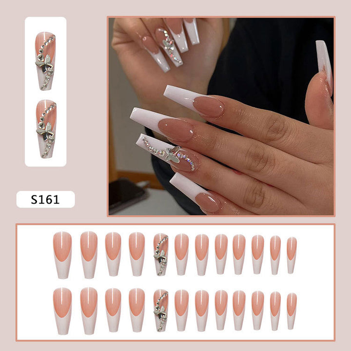 Acrylic nail set with glamorous tips embellishments and elegant accents Stornfield