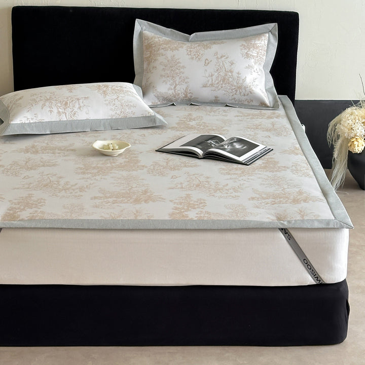 high-quality non-slip mattress protector with integrated fitted sheet and elegant jacquard pattern