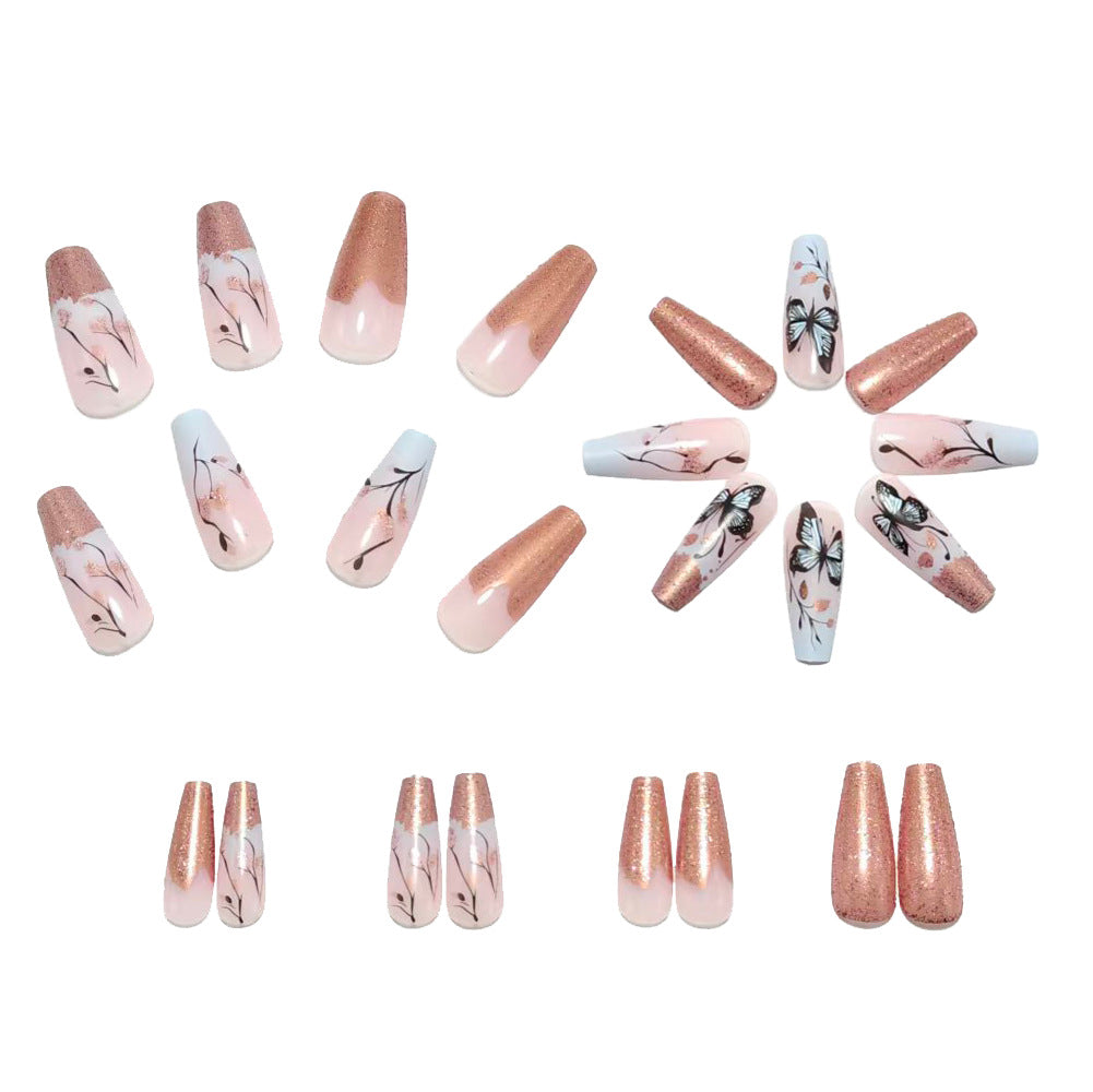 Artificial nails with filigree butterfly design and golden accents Stornfield