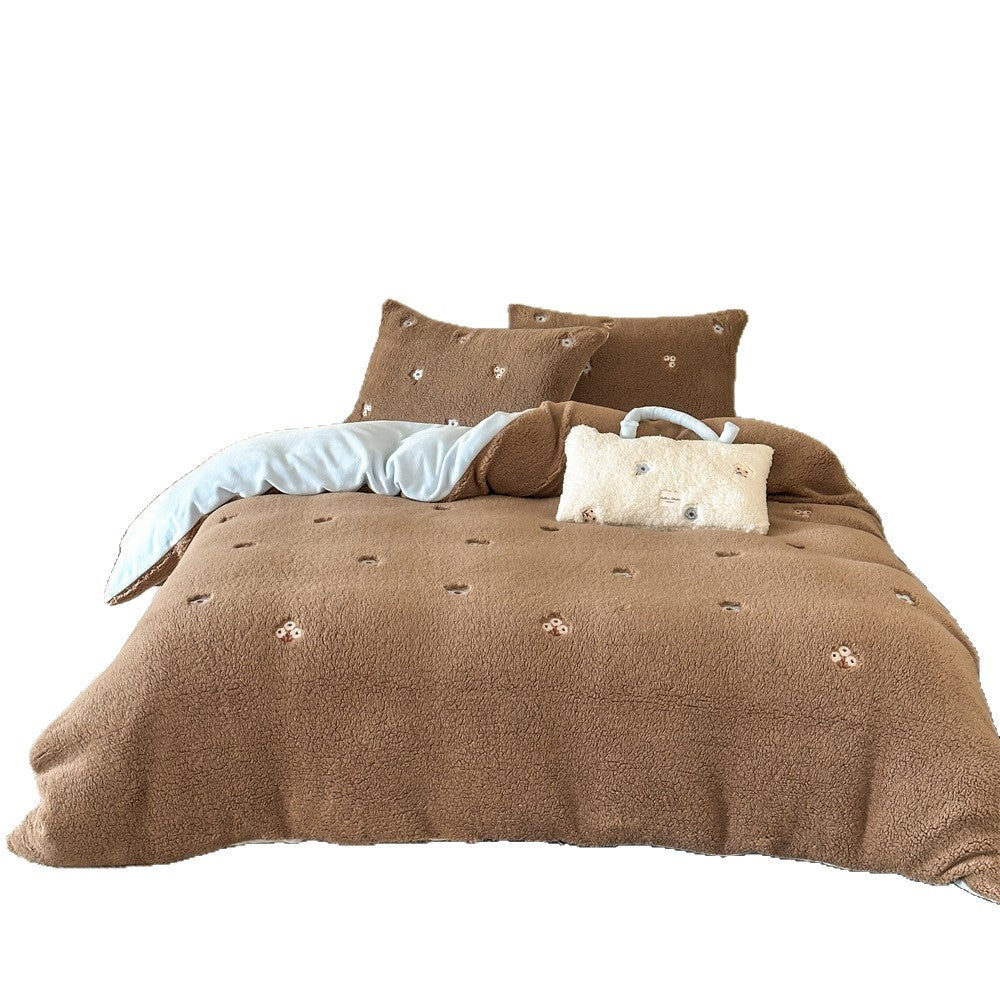 Sherpa bed blanket and reversible bed cover with embroidered flower appliqués