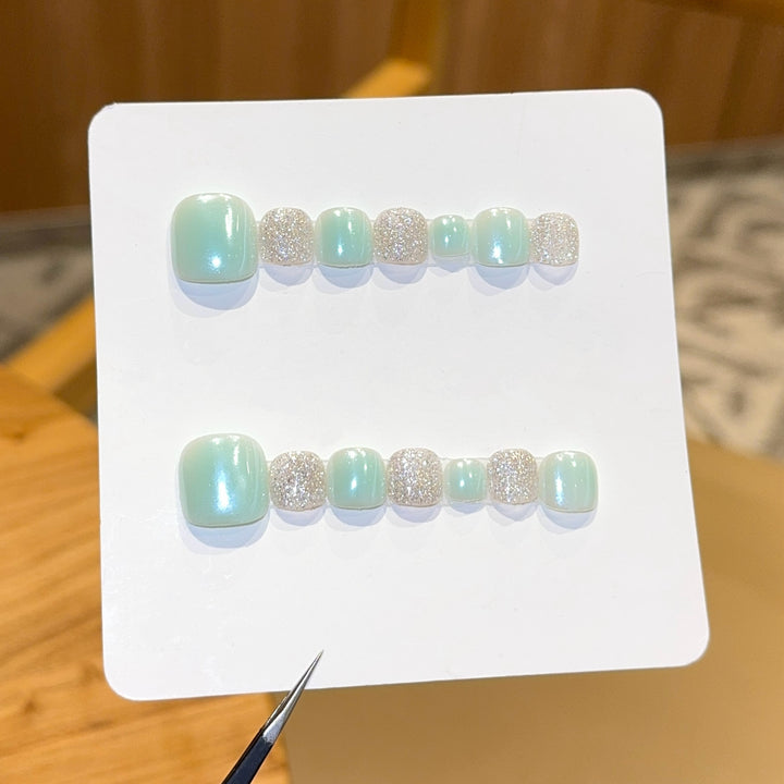 Acrylic nail set with glitter and pastel accent Stornfield