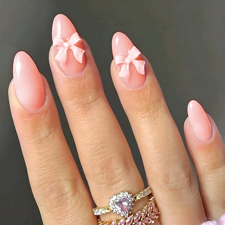 Artificial nail set with delicate bow embellishments Stornfield