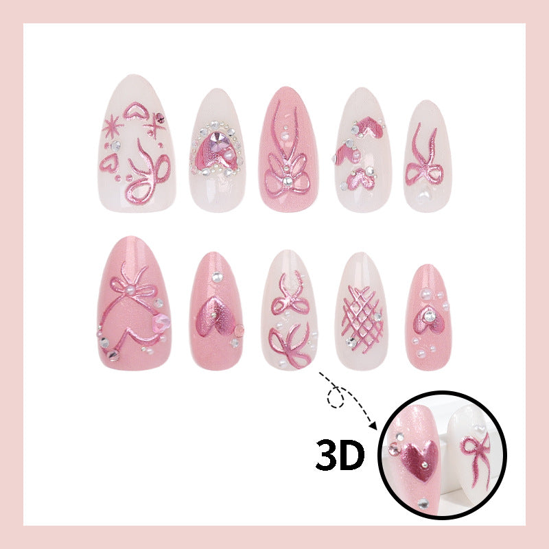 Artificial nail set with romantic bow and heart designs Stornfield
