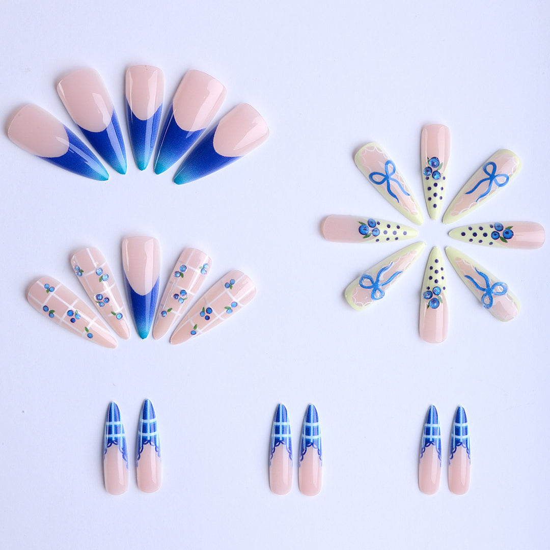 Artificial nails with playful design and elegant accents Stornfield