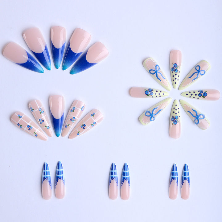 Artificial nails with playful design and elegant accents Stornfield