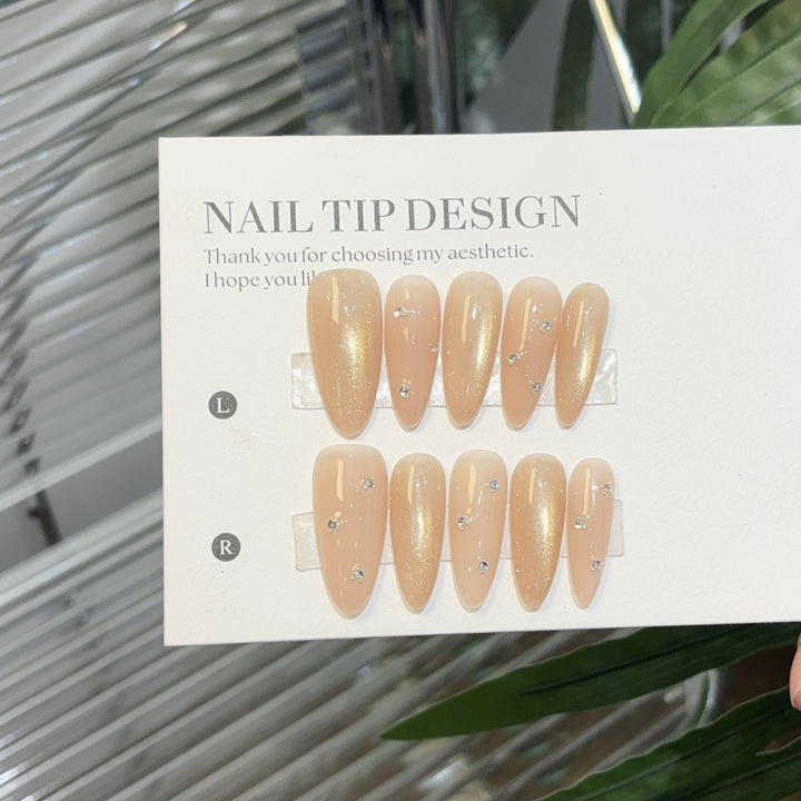 Elegant artificial nails with glitter accents Stornfield