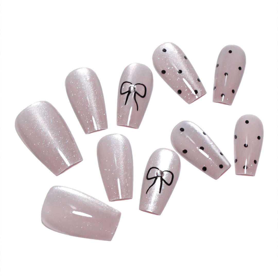 Artful Nail Extensions with Colorful Bow Motifs Stornfield