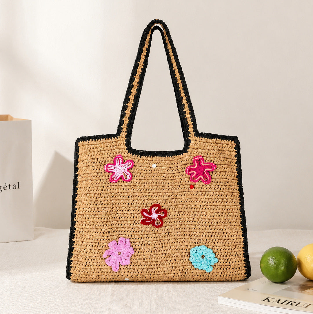 Handmade straw bag with flower appliqués Stornfield