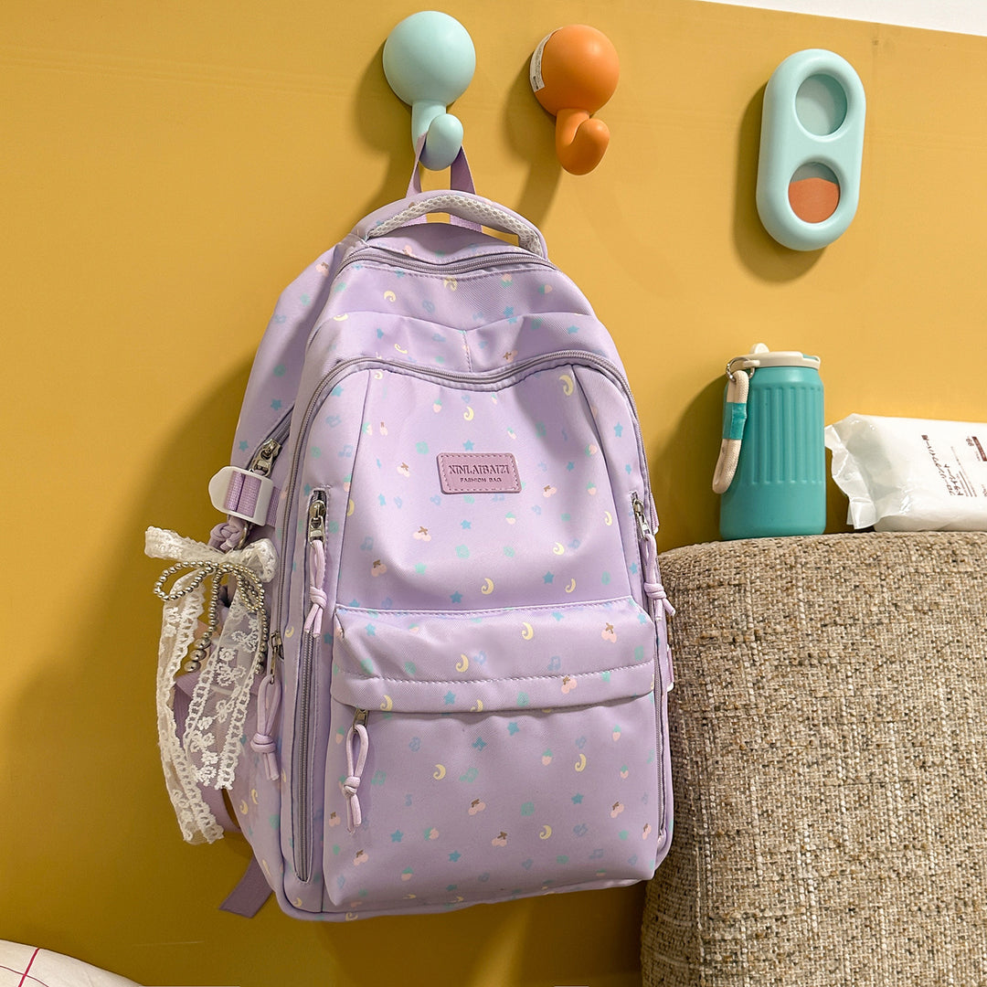 Stylish Multi-Pocket Backpack with Decorative Accents Stornfield
