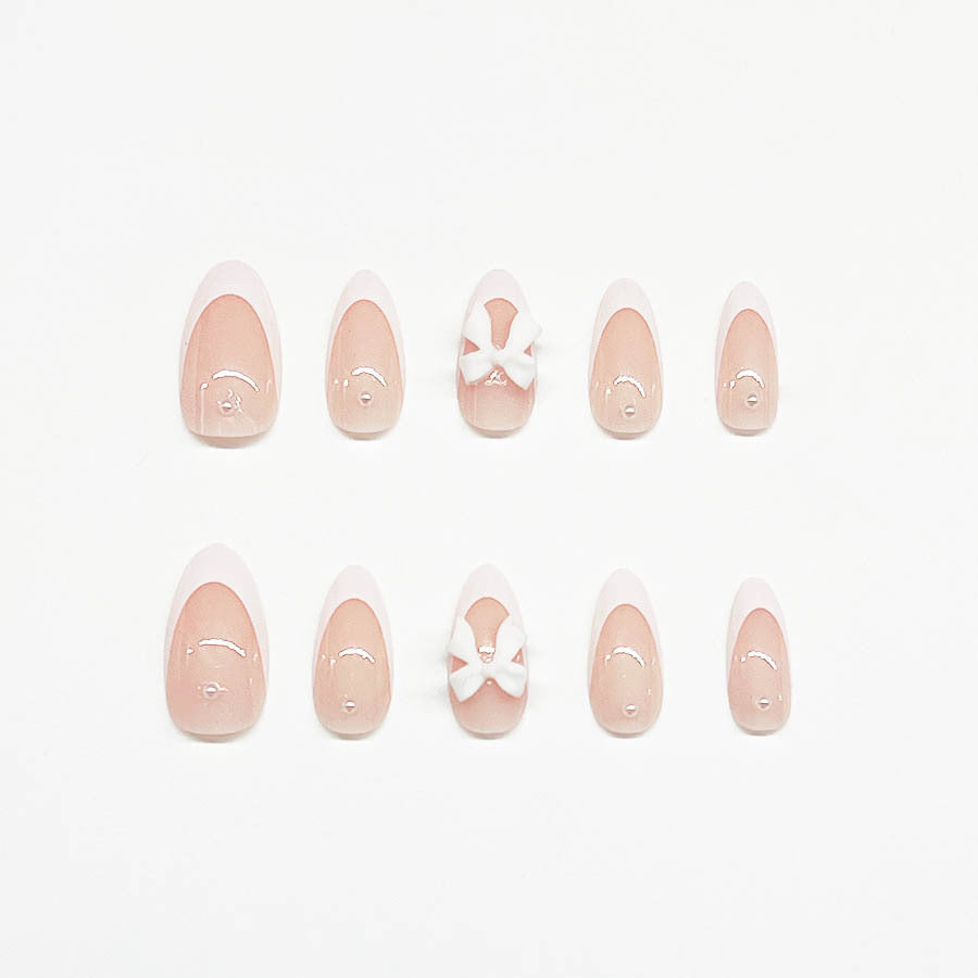 Artificial nail set with luxurious 3D bow decorations Stornfield