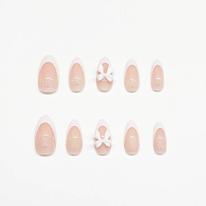 Artificial nail set with luxurious 3D bow decorations Stornfield