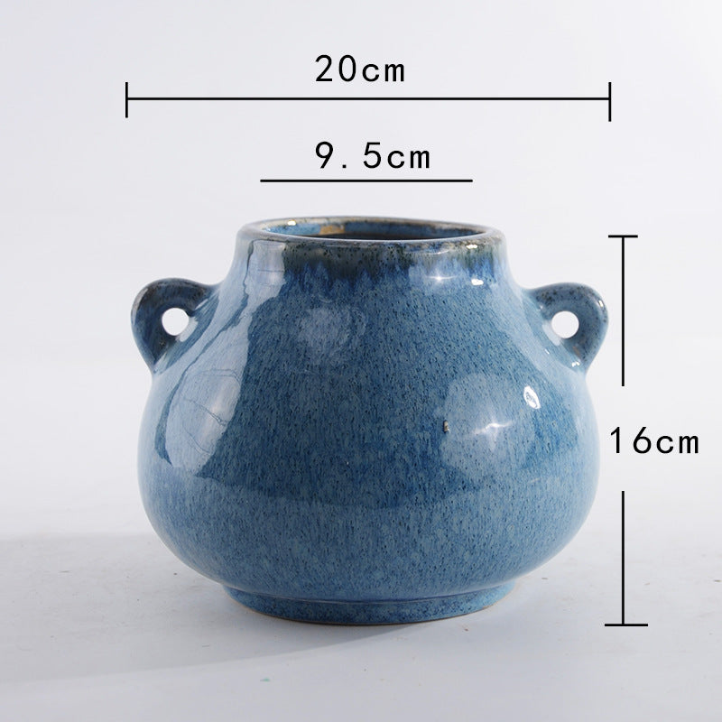Decorative ceramic pot with playful handles Stornfield