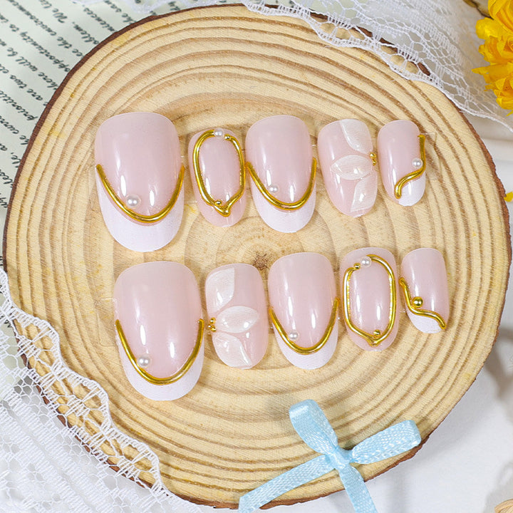 Elegant artificial nail set with romantic floral decorations Stornfield