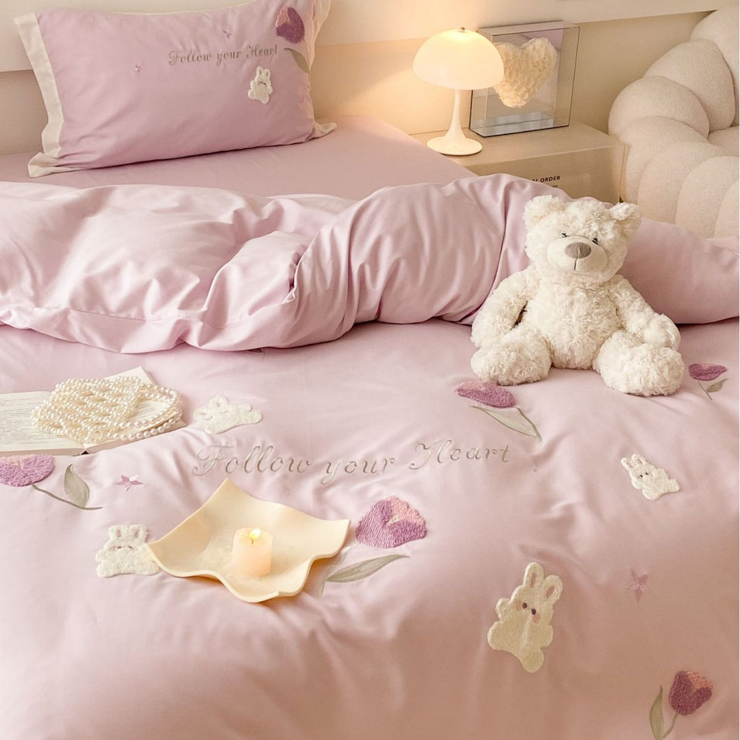 Romantic cotton satin bedding set with embroidered rabbit and flower appliqués