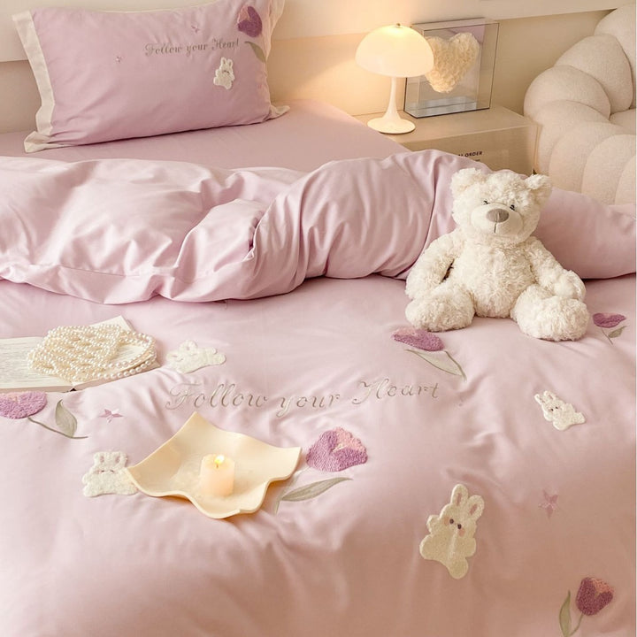 Romantic cotton satin bedding set with embroidered rabbit and flower appliqués