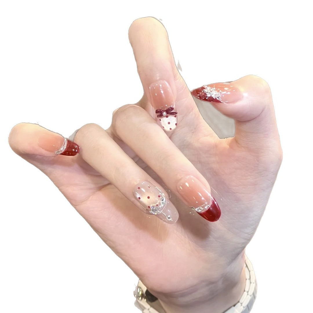 Artificial nails with glitter and tip accents Stornfield