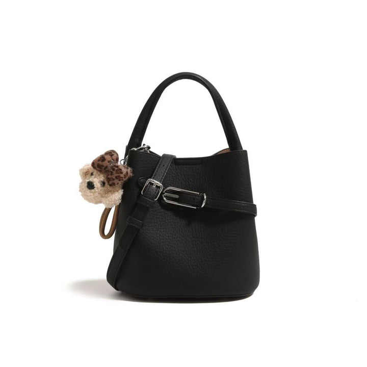 Chic Pebbled Leather Handbag with Cute Charm