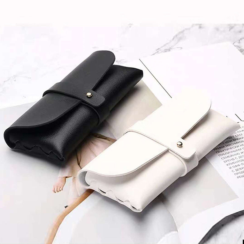 Unisex glasses case made of high-quality leather with button-crafted closure Stornfield