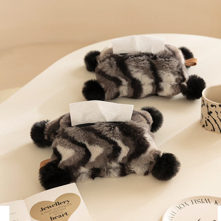 Plush napkin box cover with pompom appliqués and soft faux fur look