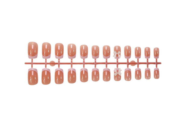 Artificial Nail Set with Romantic Bows and French Tip Stornfield