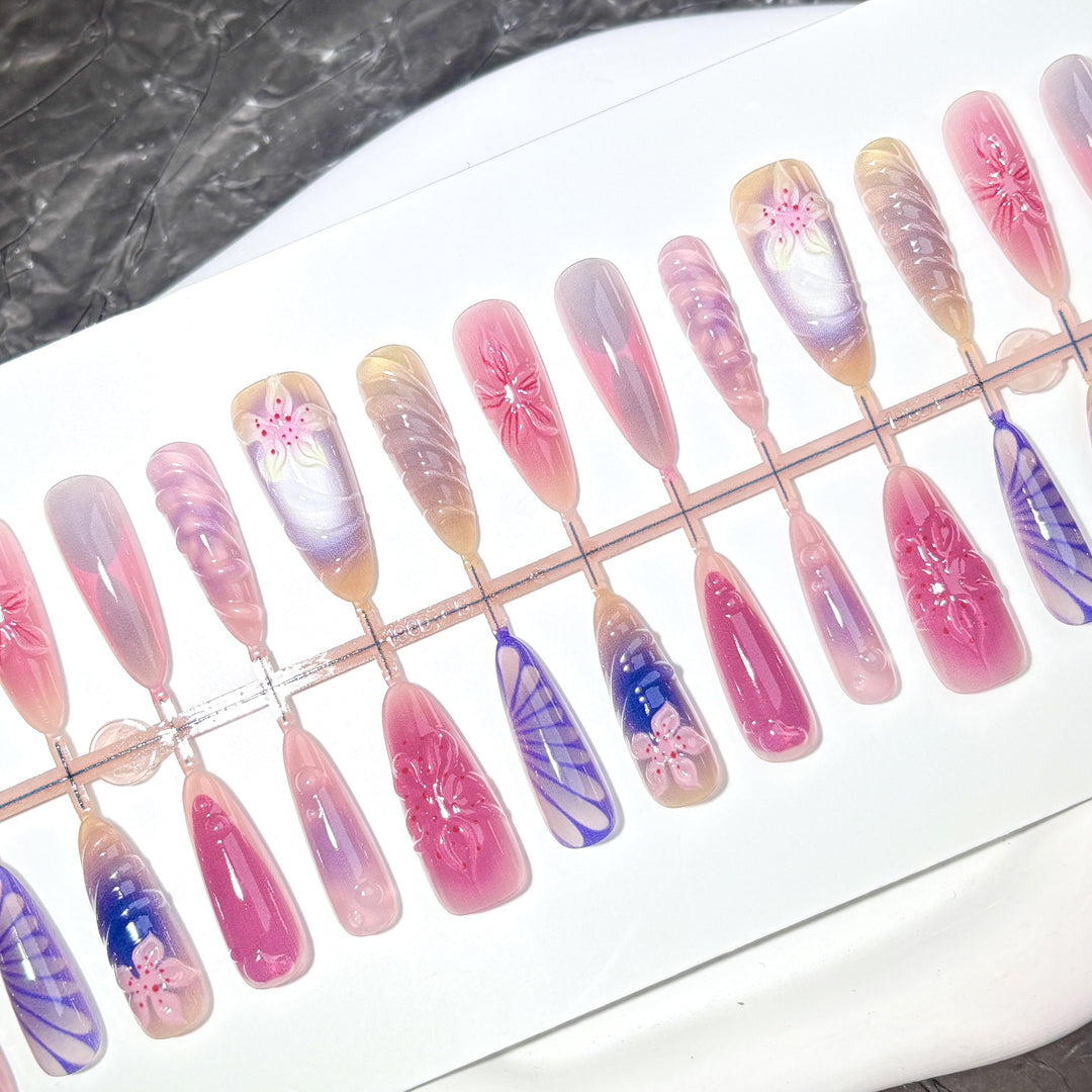 Decorative Press-On Nail Set with Floral and Artistic Designs