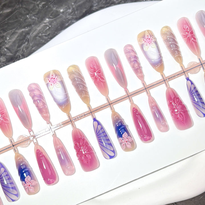 Decorative Press-On Nail Set with Floral and Artistic Designs