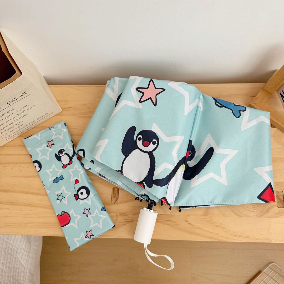Ladies collapsible umbrella with playful penguin design Stornfield