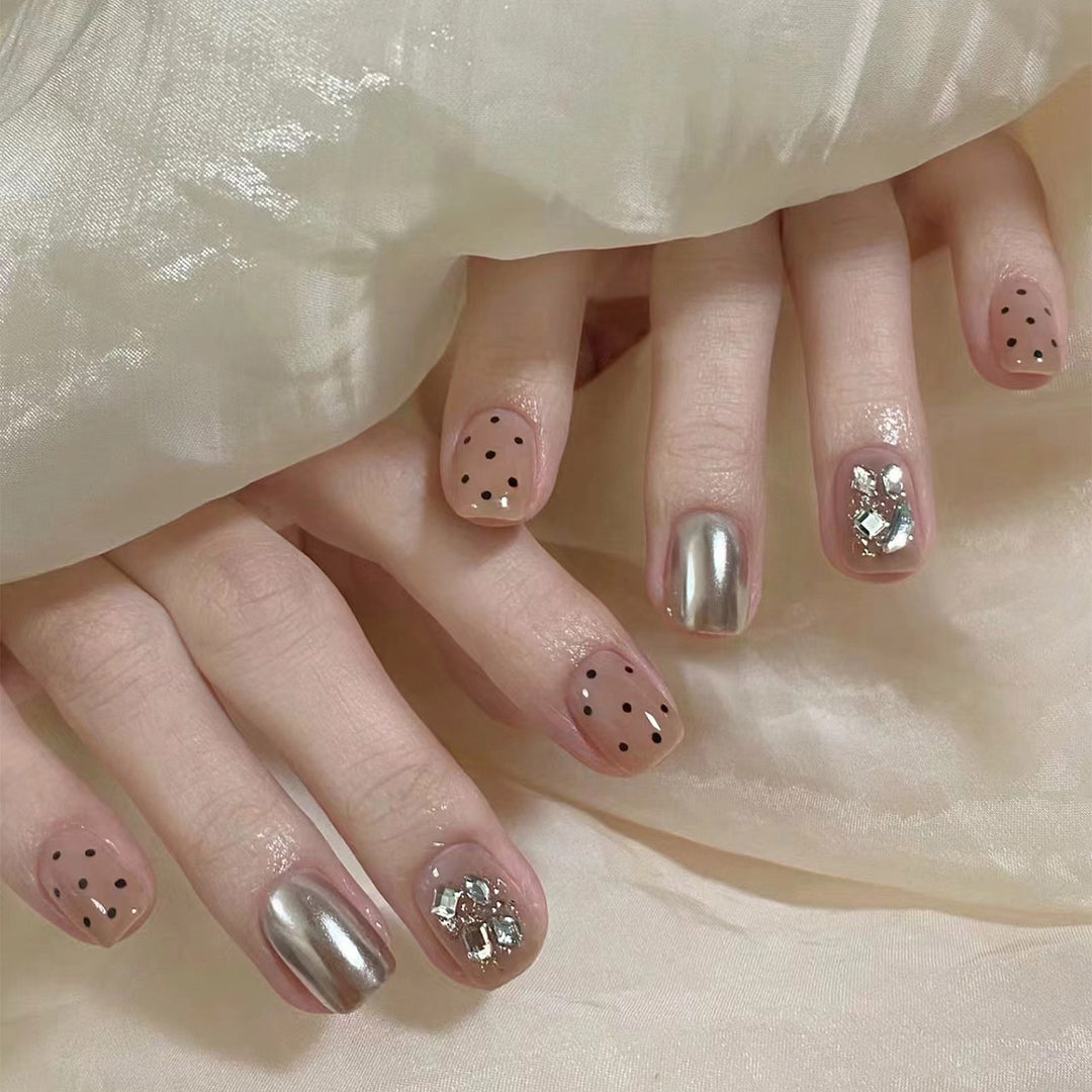 Artificial nail extensions with elegant accent decoration Stornfield